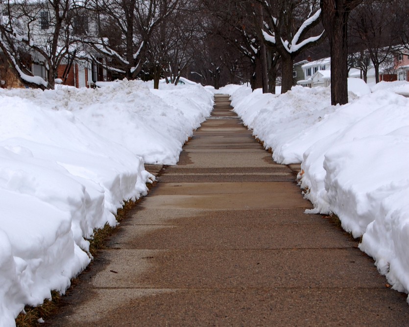 professionally snow plowed sidewalk